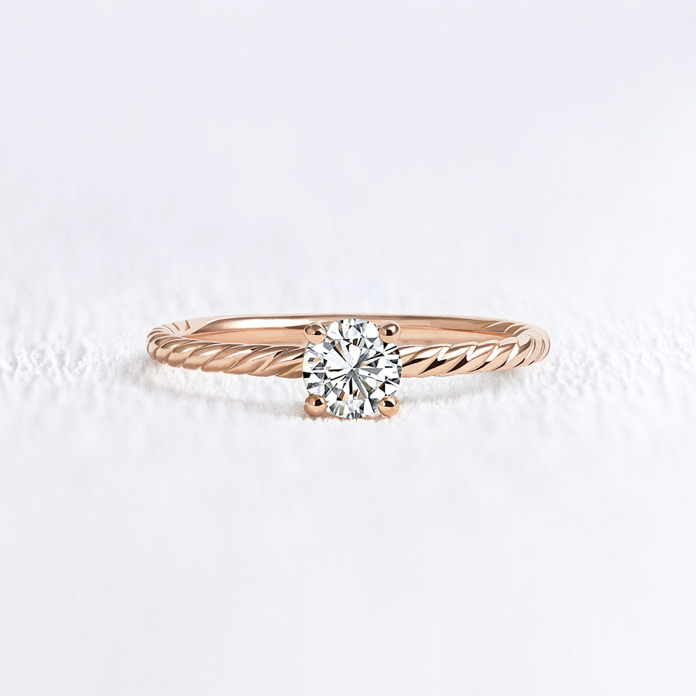 Bague de fiançailles torsadée en or rose et diamant | Deloison Paris